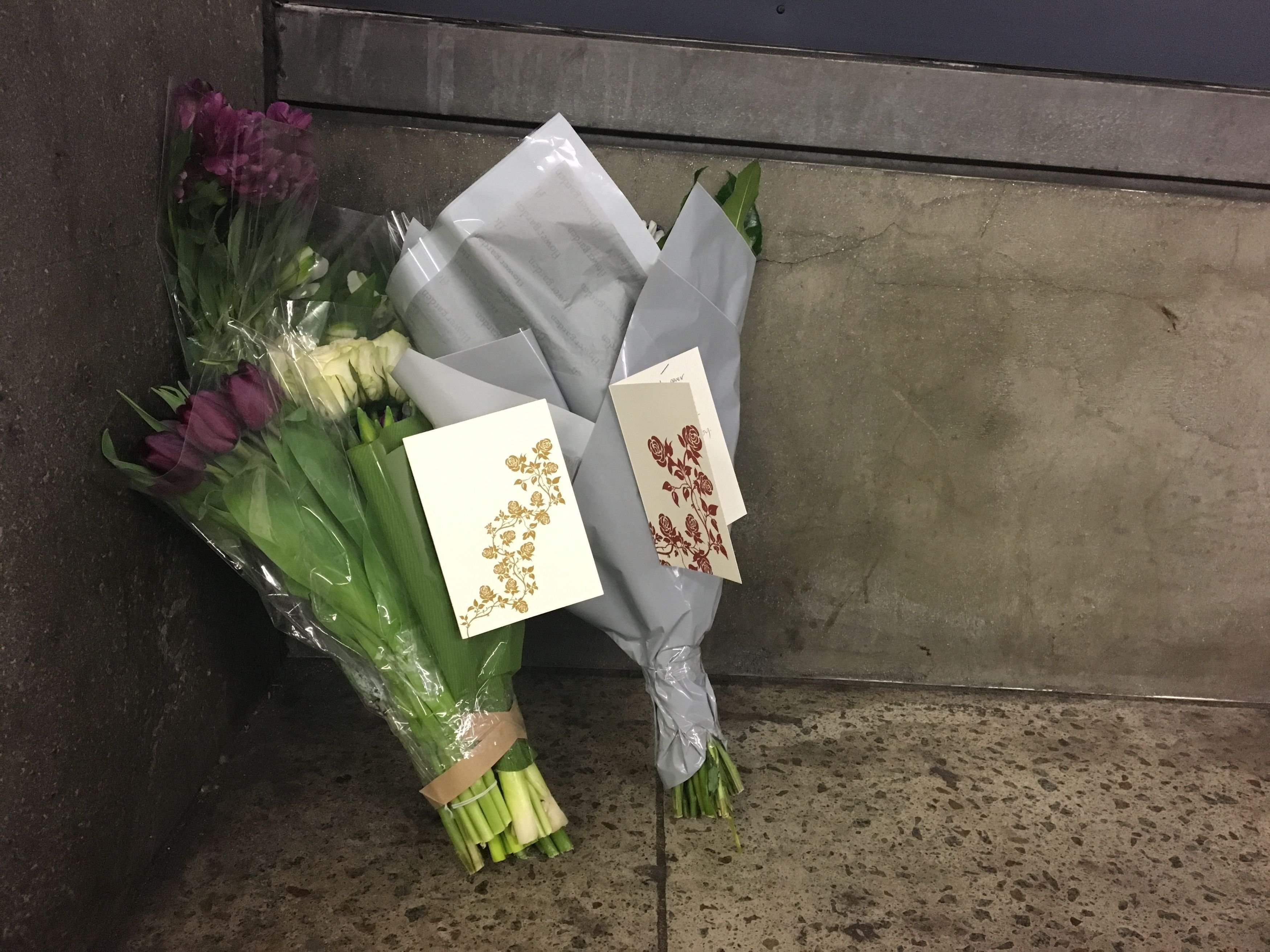 <strong>Flowers and cards from Labour leader Jeremy Corbyn and his staff, left by a member of his team at the underpass of exit three at Westminster Underground station&nbsp;</strong>