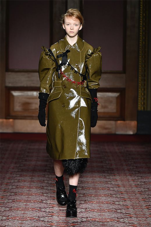 Simone Rocha's green rain coat gives a nod to Victoriana ruffles while tooting the block trend.&nbsp;