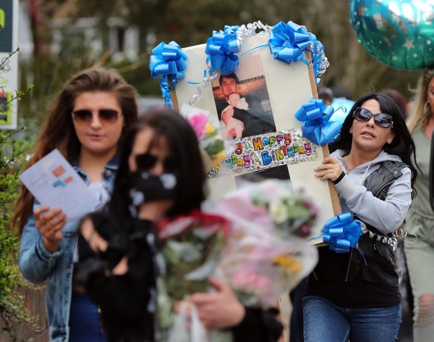 Friends and relatives of Henry Vincent arrive at the scene on South Park Crescent in Hither Green, London.