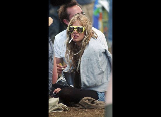 Hilary Duff smoking a cigarette (or weed)
