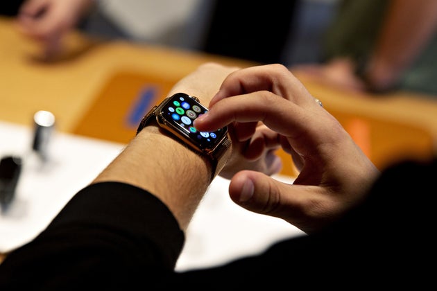 A customer uses an Apple Inc. Watch Series 4 smartwatch during a sales launch at a store in Chicago, Illinois, U.S., on Friday, Sept. 21, 2018. The iPhone XS is up to $200 more expensive than last years already pricey iPhone X and represents one of the smallest advances in the product lines history. But that means little to the Apple Inc. faithful or those seeking to upgrade their older iPhone. Photographer: Daniel Acker/Bloomberg via Getty Images