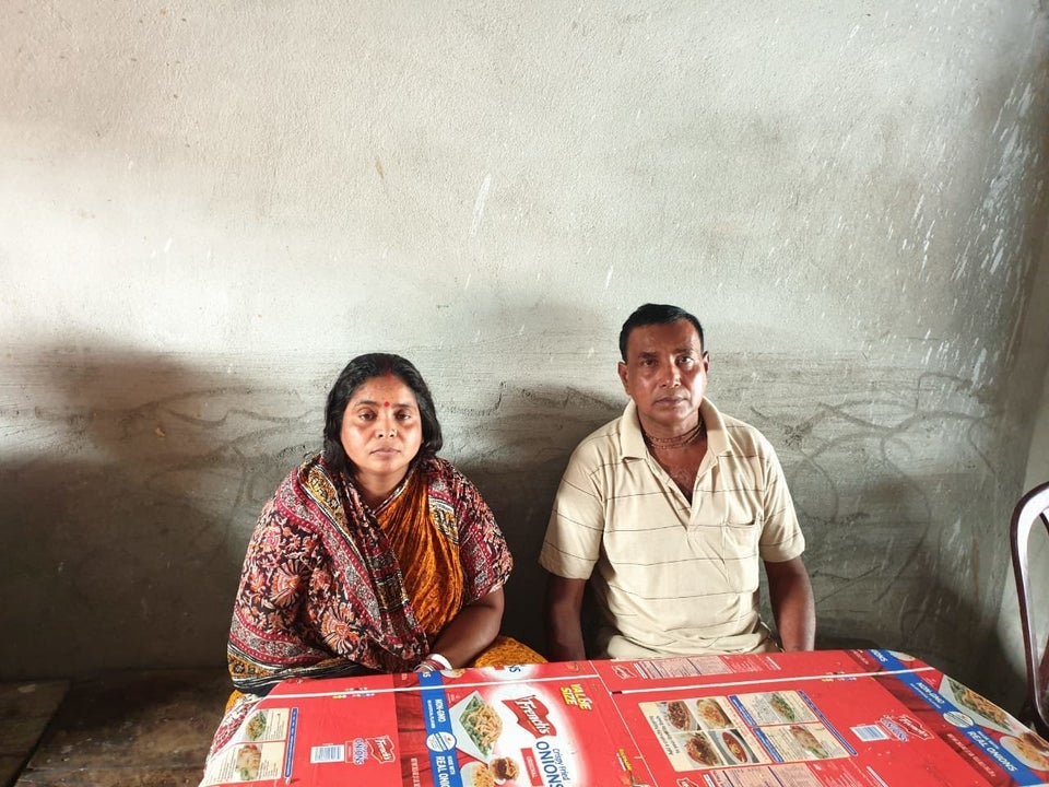 Manju and Ujjwal Burman in the shop set up by their deceased son Tapas.