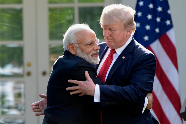 US President Donald Trump and Prime Minister Narendra Modi hug while making statements in the Rose Garden of the White House in Washington on 26 June 2017.