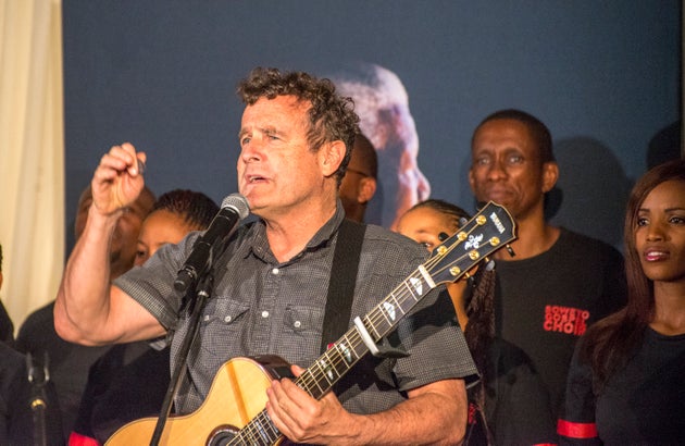 Johnny performing with the Soweto Gospel Choir at a Memorial service for Nelson Mandela in Johannesburg