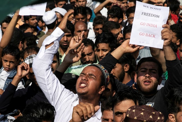 Kashmiris attend a protest after Eid-al-Adha prayers at a mosque during restrictions after the scrapping of the special constitutional status for Kashmir by the government, in Srinagar, August 12, 2019.