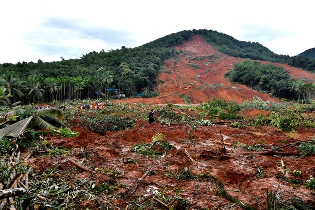 This photograph provided by the All India Congress Committee, shows a landslide site in Kavalappara, Malappuram district, Kerala, on Aug. 11, 2019.