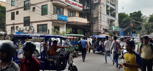 E_rickshaws driving haphazardly in Patel Nagar, New Delhi