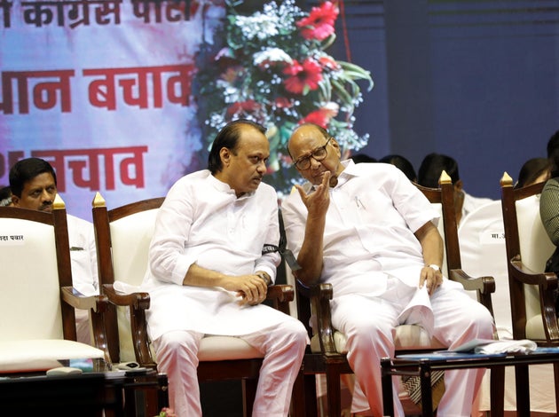 PUNE, INDIA - OCTOBER 29: NCP leader Ajit Pawar (L), and NCP President Sharad Pawar and Foziya Khan during NCP Save The Constitution March to protest against the Government at Ganesh Kala Krida on October 29, 2018 in Pune, India. (Photo by Rahul Raut/Hindustan Times via Getty Images)