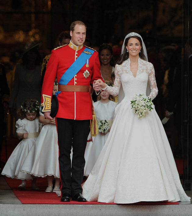 Prince William and his wife Kate, Duchess of Cambridge, emerge from Westminster Abbey, newly married.
