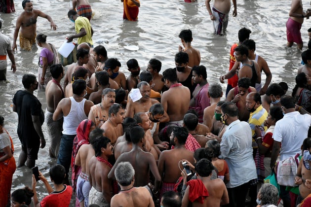 People performing rituals on the ghats of river Hooghly.