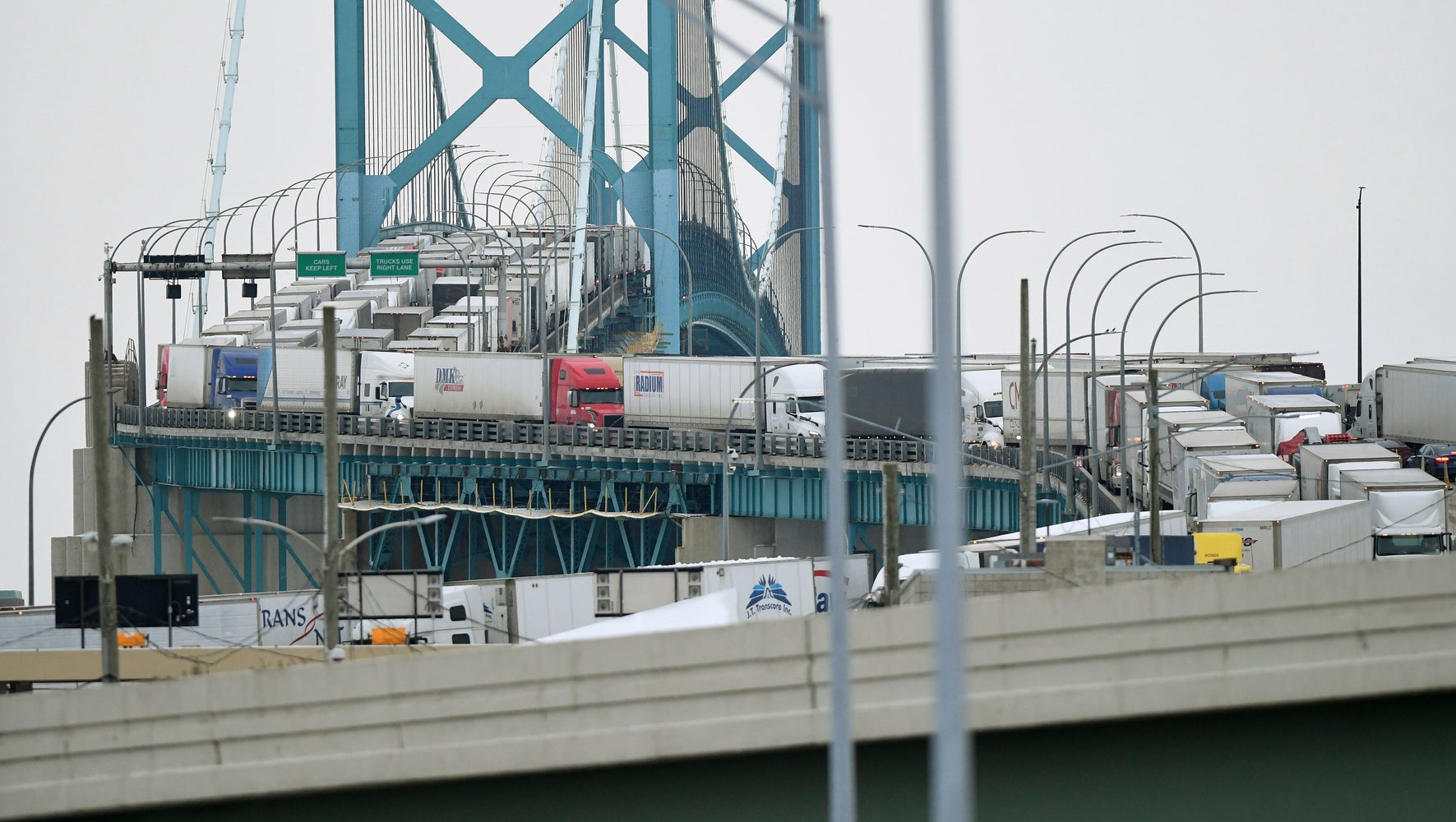 COVID-19 Vaccine Mandate Protests Threaten Border Trade Between U.S., Canada - Ambassador Bridge COVID-19 Vaccine Mandate Protests Threaten Border Trade Between U.S., Canada