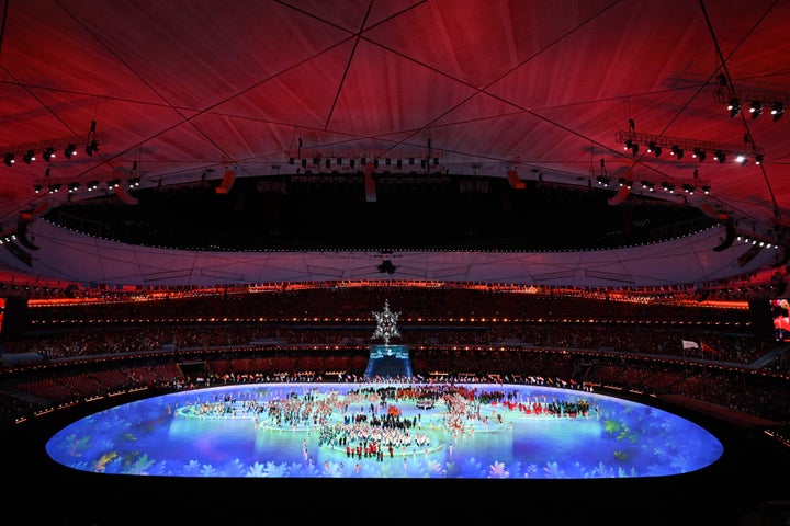 Delegations gather inside the stadium during the closing ceremony of the Beijing 2022 Winter Olympic Games.