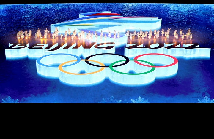 Performers dance during the Beijing 2022 Winter Olympics closing ceremony.
