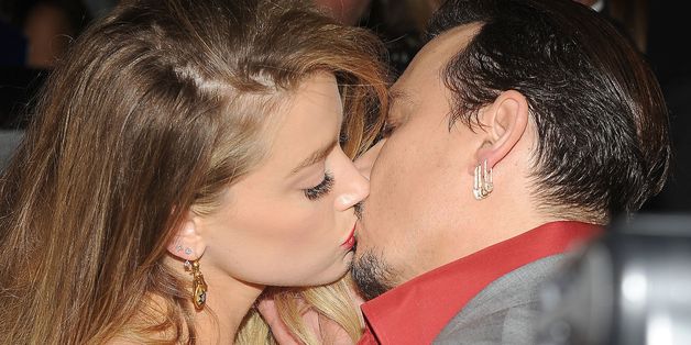 Amber Heard And Johnny Depp Seal Their TIFF Appearance With A Kiss