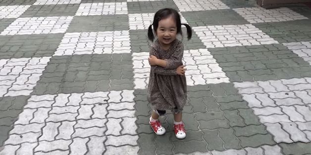 Grouchy Toddler Can't Help But Smile At Her Delightfully Squeaky Shoes