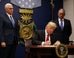 Donald Trump Signs Watered-Down Muslim Ban That Excludes Iraq