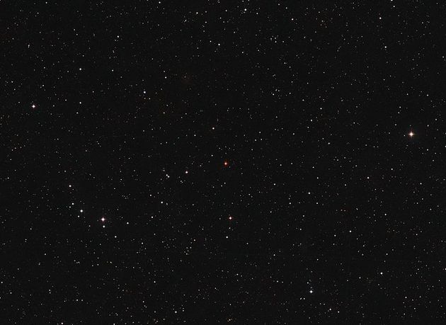 This image shows the sky around the red dwarf star Ross 128 in the constellation of Virgo (The Virgin). It was created from images forming part of the Digitized Sky Survey 2. Ross 128 appears at the centre of the picture.