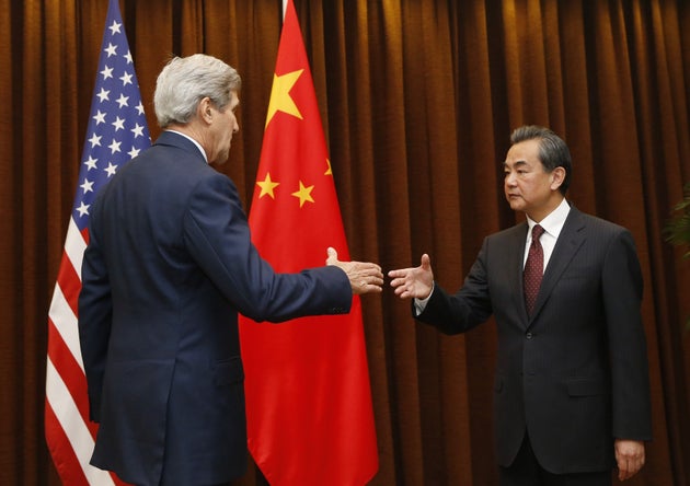 <span class='image-component__caption' itemprop="caption">"China will firmly deal with provocations from other countries," a statement from the Chinese Foreign Ministry said. In this photo, Chinese Foreign Minister Wang Yi and U.S. Secretary of State John Kerry meet in Beijing on May 16, 2015.</span>