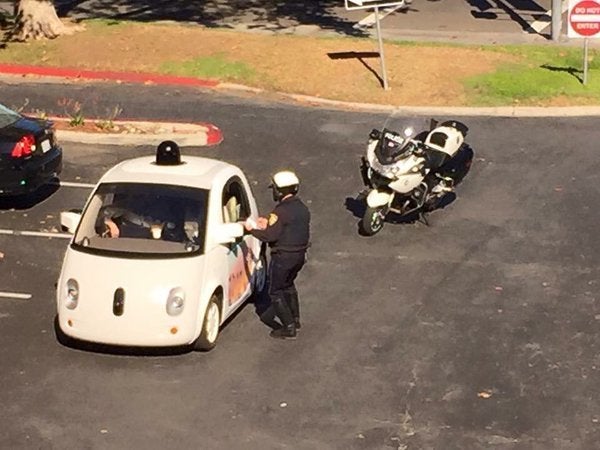 <span class='image-component__caption' itemprop="caption">A Google self-driving car is pulled over for going too slow by a Mountain View, California police officer.</span>