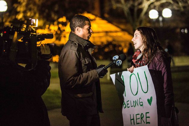 A supporter talks to the media during a solidarity event organized by Muslims at the University of Michigan.