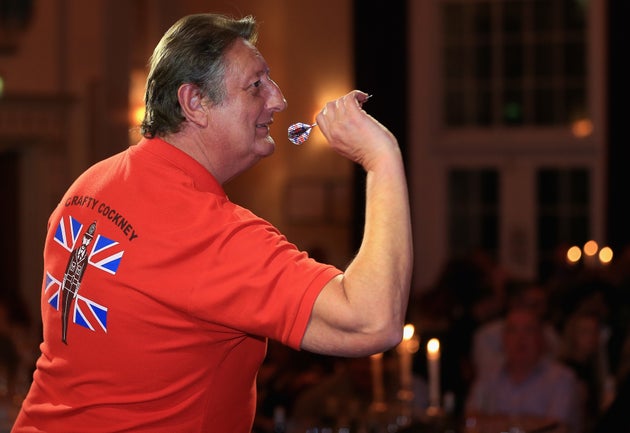 Former darts champion dropped from TV over abuse comments
