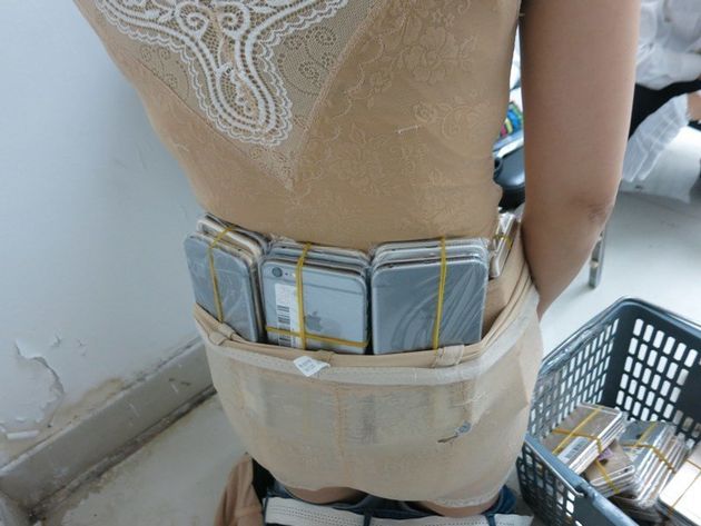 Woman Caught Smuggling 102 iPhones Into China