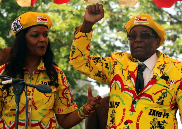 President Robert Mugabe and his wife, Grace Mugabe, attend a rally of his ruling ZANU-PF party in Harare on Nov. 8.
