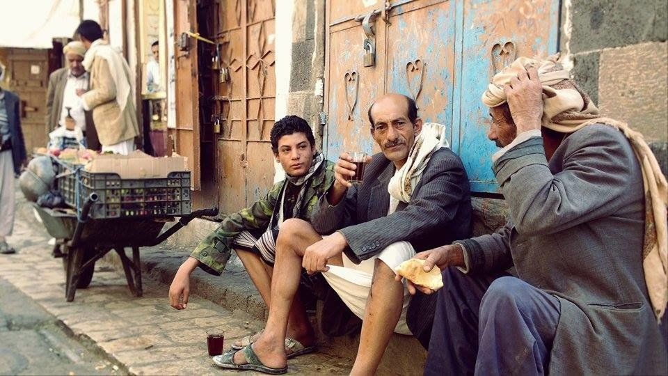 <span class='image-component__caption' itemprop="caption">Three men sit in the old city of Sanaa on April 19, 2015. "�We are enjoying our cup of tea under the melody of those stupid jets hovering all over," one says.</span>