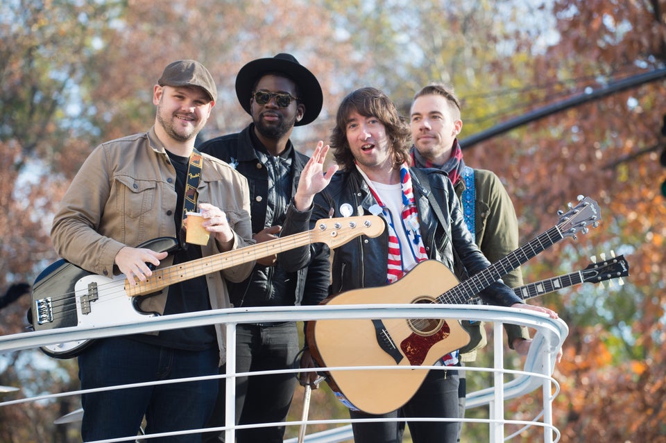 <span class='image-component__caption' itemprop="caption">Plain White T's members wave from their float. </span>