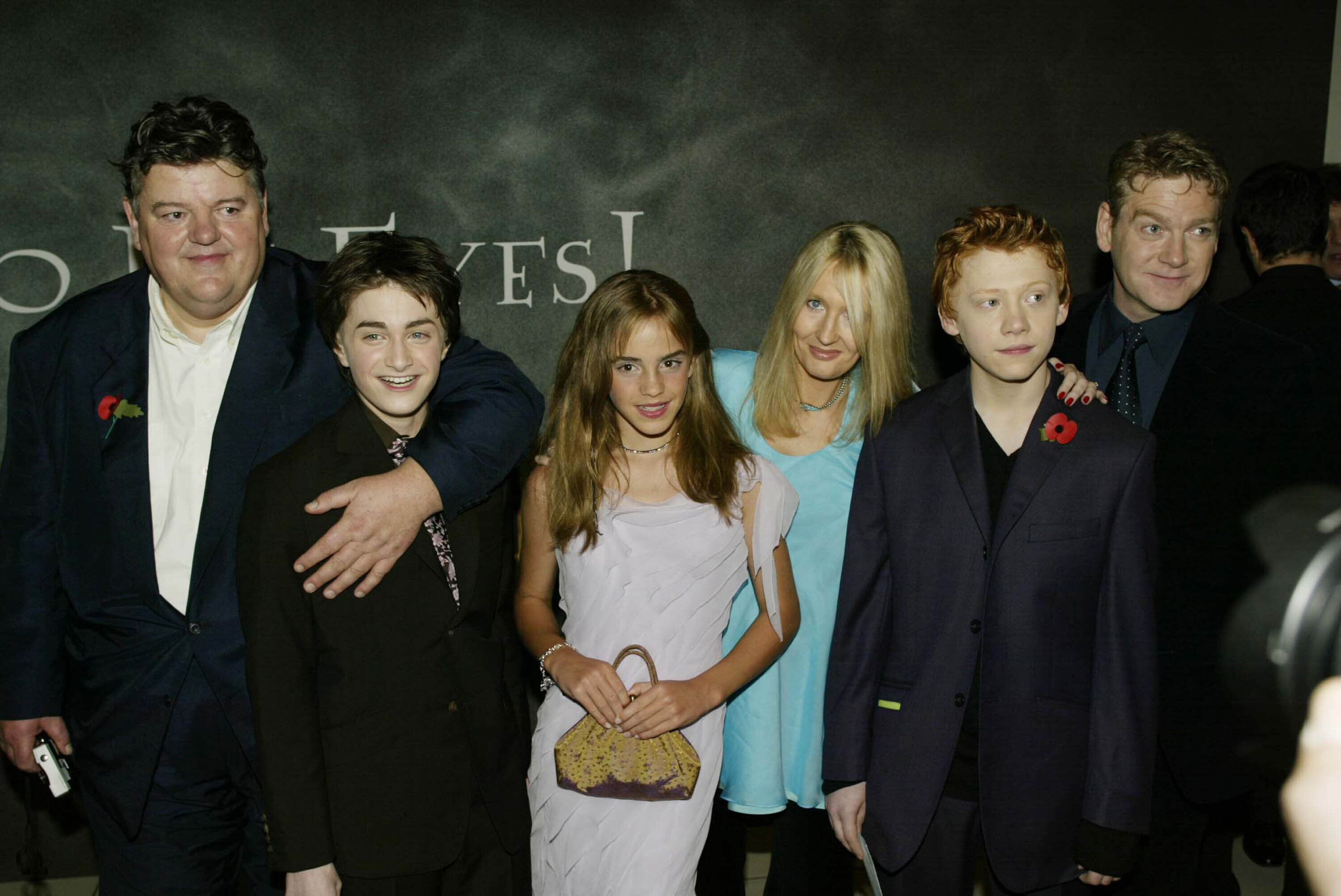 Robbie Coltrane, Daniel Radcliffe, Emma Watson, J.K. Rowling, Rupert Grint and Kenneth Branagh appear on the U.K. Most desirable of "Harry Potter and the Chamber of Secrets" in 2002.