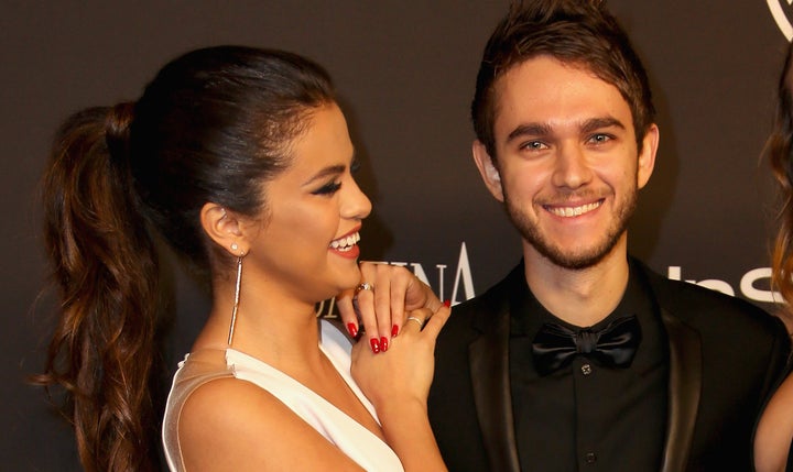 BEVERLY HILLS, CA - JANUARY 11: (L-R) Singer/Actress Selena Gomez, producer and DJ Zedd and model Cara Delevingne attend the 2015 InStyle And Warner Bros. 72nd Annual Golden Globe Awards Post-Party at The Beverly Hilton Hotel on January 11, 2015 in Beverly Hills, California. (Photo by Rachel Murray/Getty Images)