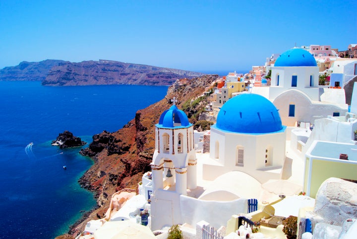 Blue and white churches of Oia village, Santorini, Greece