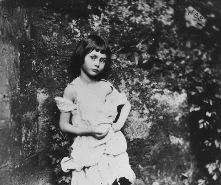 1858: Alice Liddell (1852 - 1934), the inspiration for Lewis Carroll's fictional character Alice in 'Alice in Wonderland'. She is posing as 'The Beggar-Maid.' (Photo by Lewis Carroll/Getty Images)