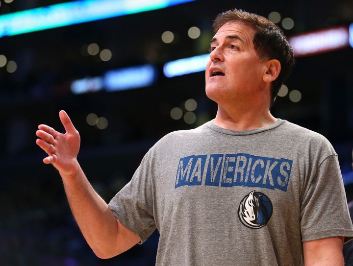 Dallas Mavericks owner Mark Cuban talks to a referee during a timeout in the game with the Los Angeles Lakers at Staples Center on April 12, 2015 in Los Angeles, California.