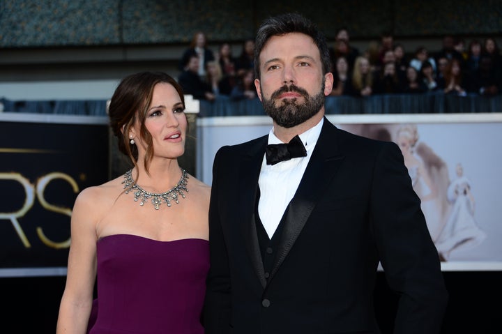 Actor/director Ben Affleck and wife actress Jennifer Garner arrive on the red carpet for the 85th Annual Academy Awards on Fe