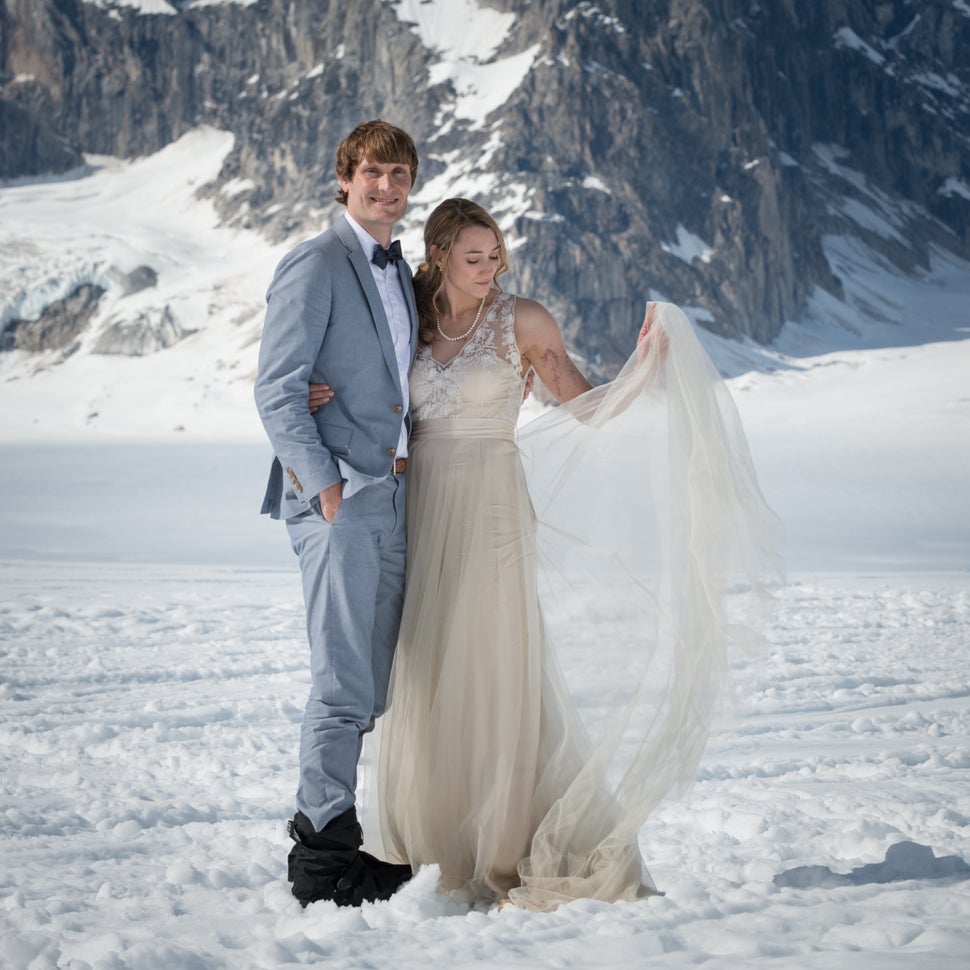 Lindsay and John pose on Ruth Glacier in Alaska.