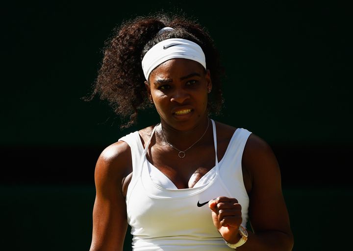 LONDON, ENGLAND - JULY 09: Serena Williams of the United States celebrates during the Ladies Singles Semi Final match against Maria Sharapova of Russia during day ten of the Wimbledon Lawn Tennis Championships at the All England Lawn Tennis and Croquet Club on July 9, 2015 in London, England. (Photo by Julian Finney/Getty Images)