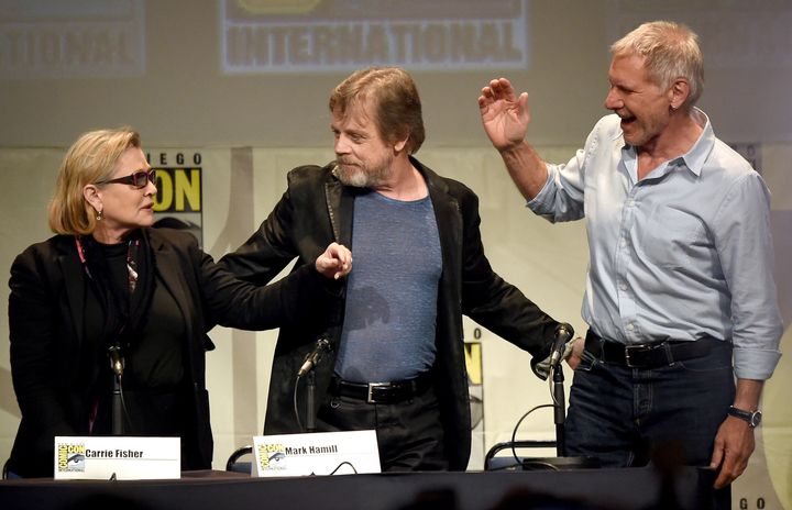 SAN DIEGO, CA - JULY 10: (L-R) Actors Carrie Fisher, Mark Hamill and Harrison Ford pose onstage at the Lucasfilm panel during Comic-Con International 2015 at the San Diego Convention Center on July 10, 2015 in San Diego, California. (Photo by Kevin Winter/Getty Images)