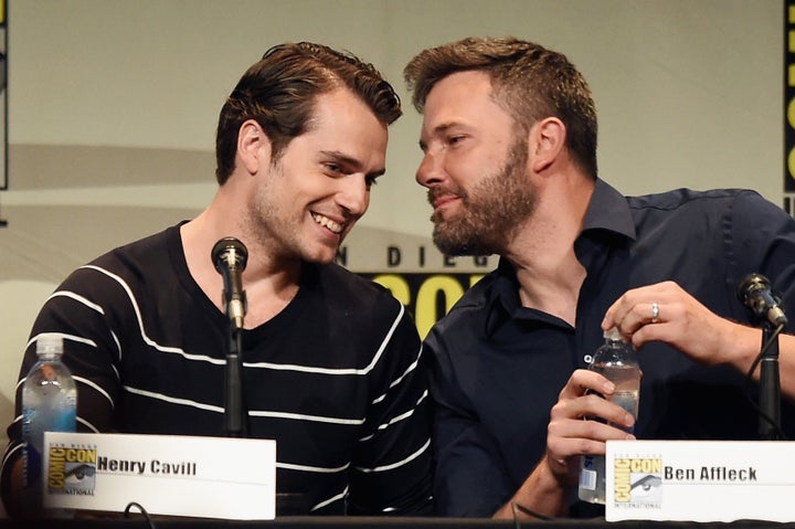 SAN DIEGO, CA - JULY 11: Actors Henry Cavill (L) and Ben Affleck from 'Batman v. Superman: Dawn of Justice' attend the Warner Bros. presentation during Comic-Con International 2015 at the San Diego Convention Center on July 11, 2015 in San Diego, California. (Photo by Kevin Winter/Getty Images)