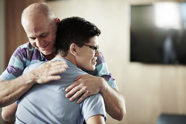 Nike's Tobie Hatfield and Matthew Walzer embrace.