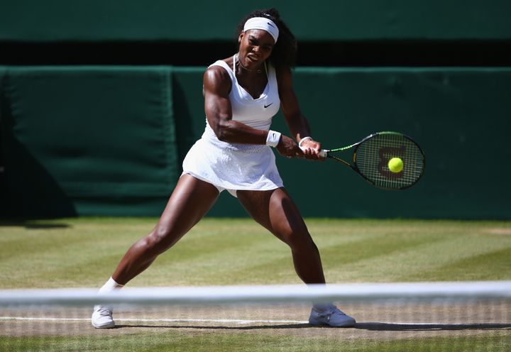 LONDON, ENGLAND - JULY 11: Serena Williams of the United States plays a backhand in the Final Of The Ladies' Singles against Garbine Muguruza of Spain during day twelve of the Wimbledon Lawn Tennis Championships at the All England Lawn Tennis and Croquet Club on July 11, 2015 in London, England. (Photo by Clive Brunskill/Getty Images)