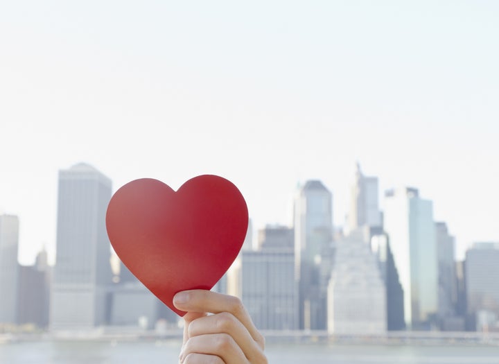 USA, New York State, New York City, Manhattan, Hand holding heart shape