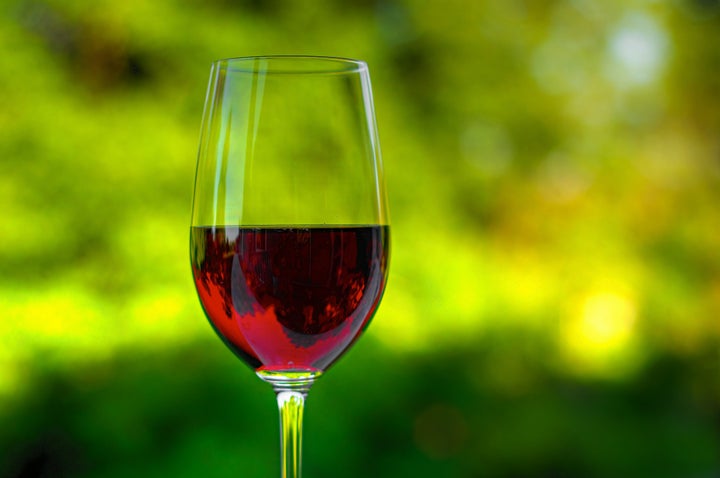 We managed to get most things unpacked today in our new place, and celebrated with our drink of choice at dinner...some red wine. This is taken at sunset on our balcony, which faces east now, which means the wine was in shadow. Attempted fill flash, settled for an HDR.