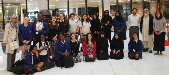 The students pose for a photo after their session at Twitter.