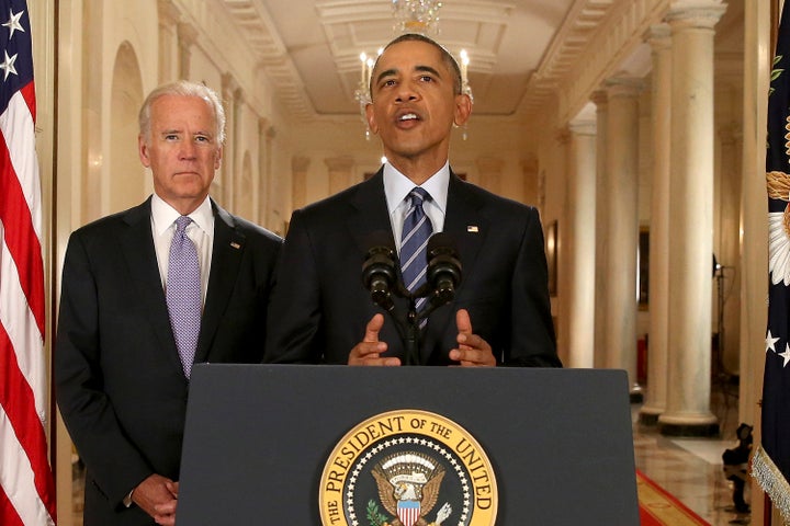 WASHINGTON, DC - JULY 14: President Barack Obama, standing with Vice President Joe Biden, conducts a press conference in the East Room of the White House in response to the Iran Nuclear Deal, on July 14, 2015 in Washington, DC. The landmark deal will limit Iran's nuclear program in exchange for relief from international sanctions. The agreement, which comes after almost two years of diplomacy, has also been praised by Iranian President Hassan Rouhani. (Photo by Andrew Harnik - Pool/Getty Images)