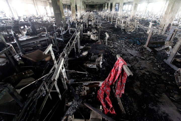 03 May 2013, Savar, Bangladesh, Bengal --- A scarf of a garment worker is seen in the burnt interior of garment factory Tazre