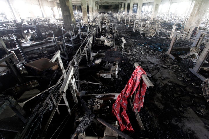 03 May 2013, Savar, Bangladesh, Bengal --- A scarf of a garment worker is seen in the burnt interior of garment factory Tazreen Fashions, after a devastating fire, in Savar, in this file picture taken November 28, 2012. To match Special Report BANGLADESH-GARMENTS/ REUTERS/Andrew Biraj/ Files (BANGLADESH - Tags: DISASTER BUSINESS TEXTILE) --- Image by ï¿½ ANDREW BIRAJ/Reuters/Corbis