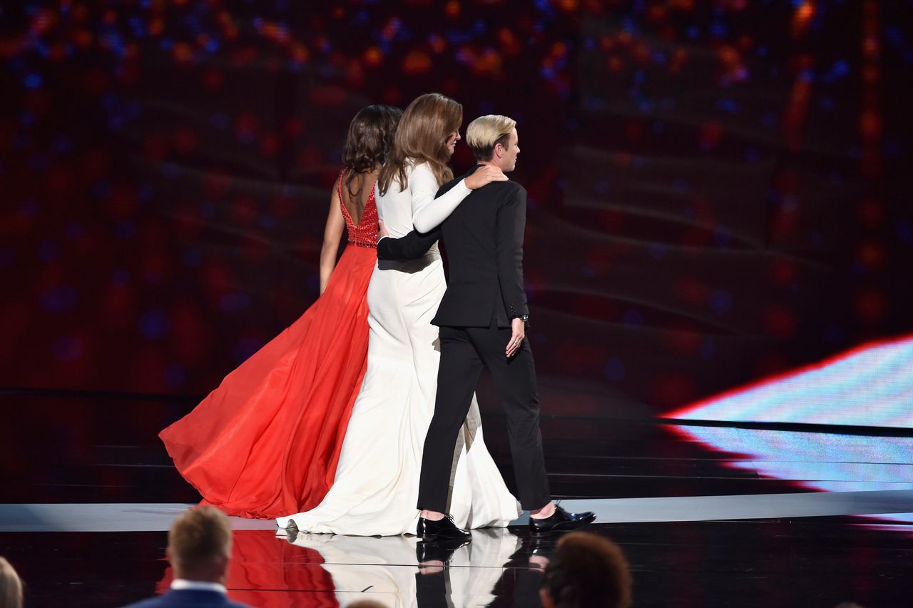 LOS ANGELES, CA - JULY 15: Honoree Caitlyn Jenner (C) accepts the Arthur Ashe Courage Award from former professional soccer player Abby Wambach (R) onstage during The 2015 ESPYS at Microsoft Theater on July 15, 2015 in Los Angeles, California. (Photo by Kevin Winter/Getty Images)