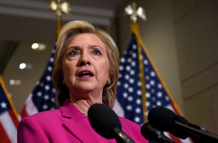 Democratic presidential candidate Hillary Rodham Clinton speaks to reporters on Capitol Hill in Washington, Tuesday, July 14, 2015. Clinton, who spoke about the deal reached with Iran, attended meetings on Capitol Hill with House and Senate Democrats. (AP Photo/Susan Walsh)