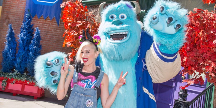 ANAHEIM, CA - OCTOBER 06: In this handout photo provided by Disney Parks, Gwen Stefani meets Sulley from the Disney-Pixar films 'Monsters, Inc.' and 'Monsters University' at Disney California Adventure park October 6, 2014 in Anaheim, California. The 'Halloween Time' celebration at the Disneyland Resort, which features special attractions, decor and entertainment, continues through October 31, 2014. (Photo by Paul Hiffmeyer/Disney Parks via Getty Images)